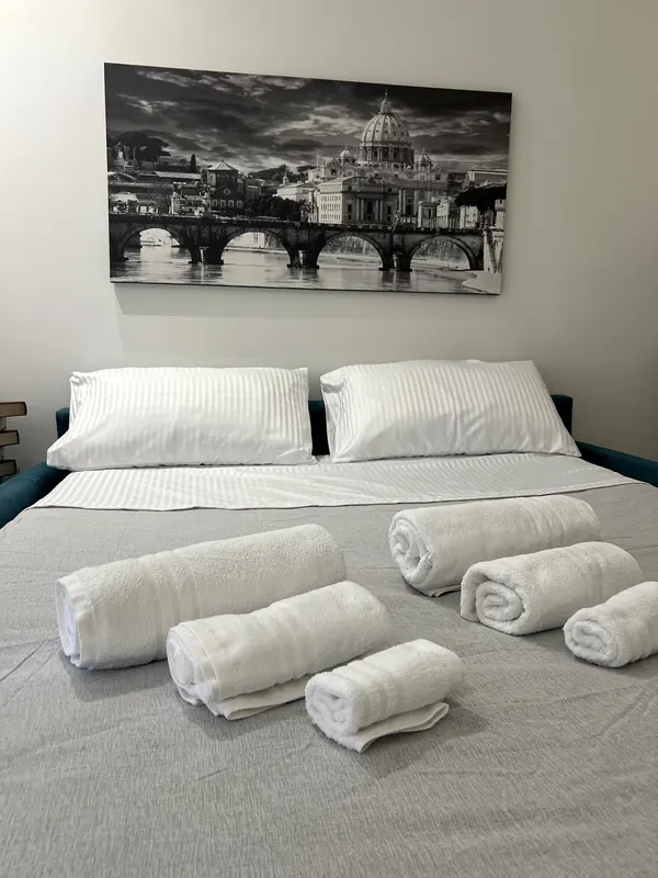 Letto con lenzuola fresche e set di asciugamani, Il Pianoforte, Monteverde Roma