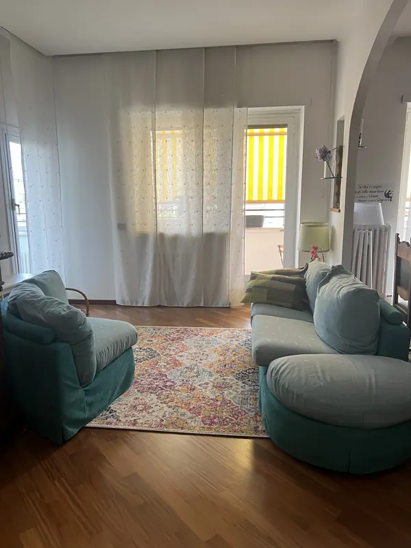 Salotto con due divani e tappeto, La Veranda, Monteverde Roma